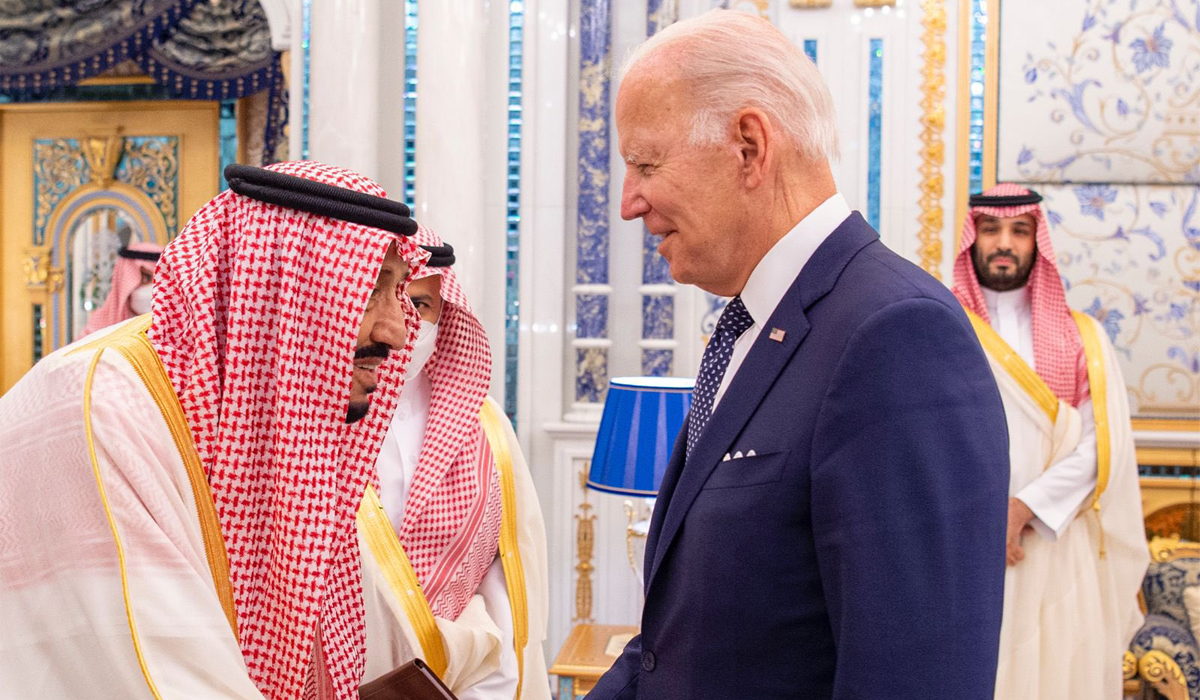 Biden meets Saudi king with a handshake